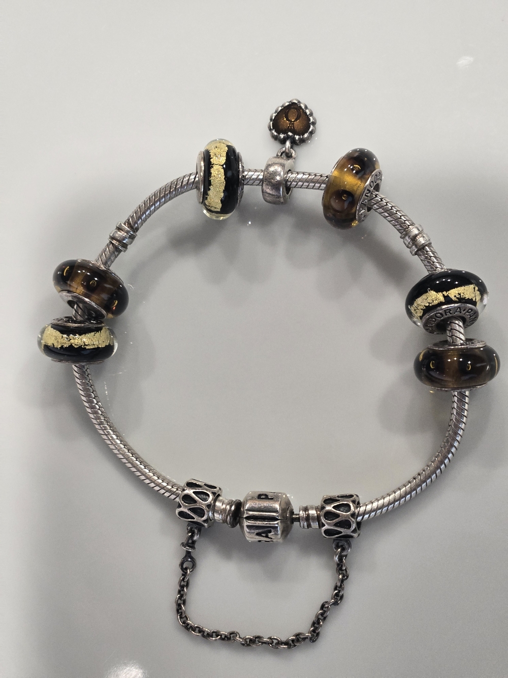 Pandora Silver Bracelet with Black and Gold Murano Glass Beads